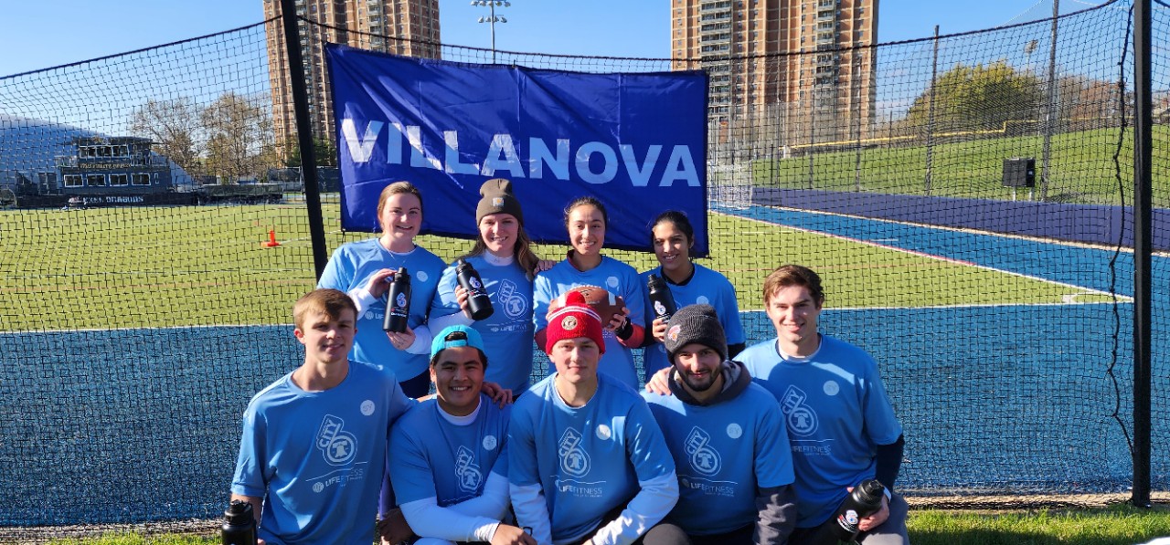 Students posing for flag football champion photo