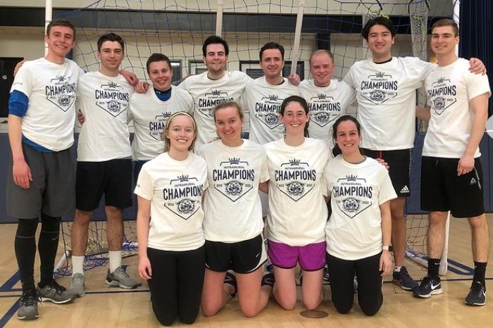 Students posing for handball champion photo