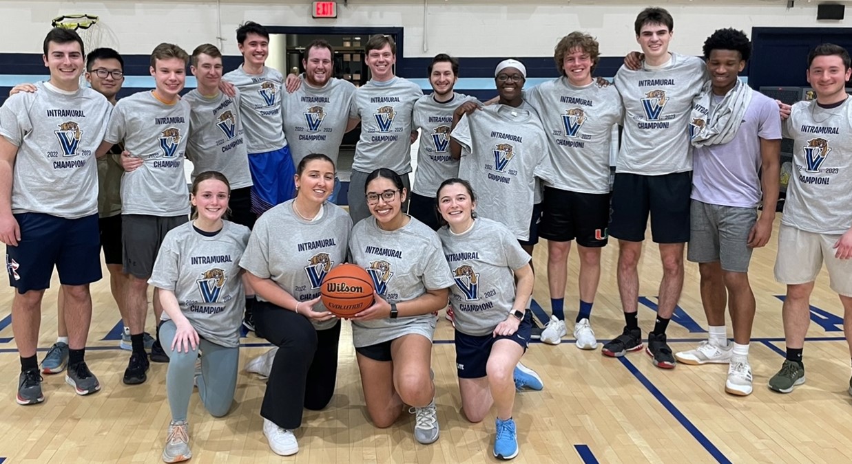 Students posing for basketball champion photo