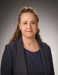 Director of Health Promotion Stacy Andes stands outside.