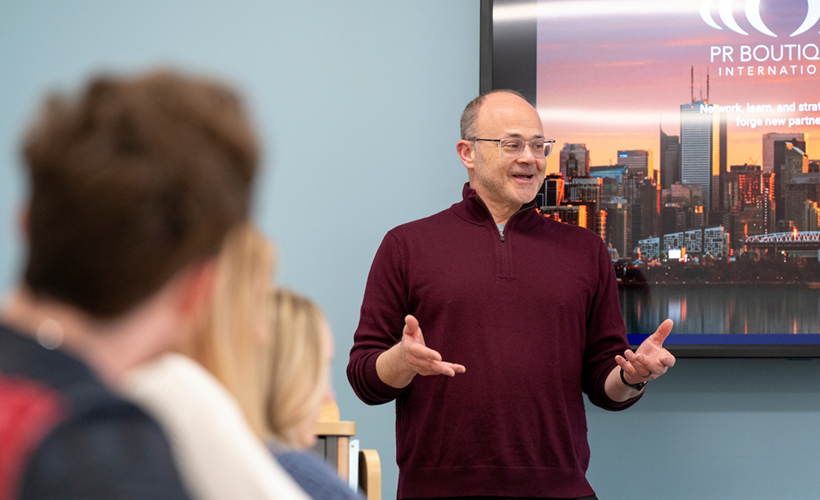 Bill Cowen teaching in classroom 