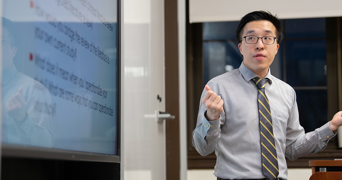 Counseling faculty teaching his class