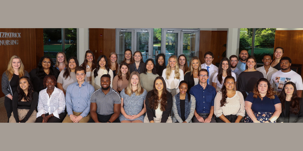 A group of male and female students who received the Conway Scholarship.