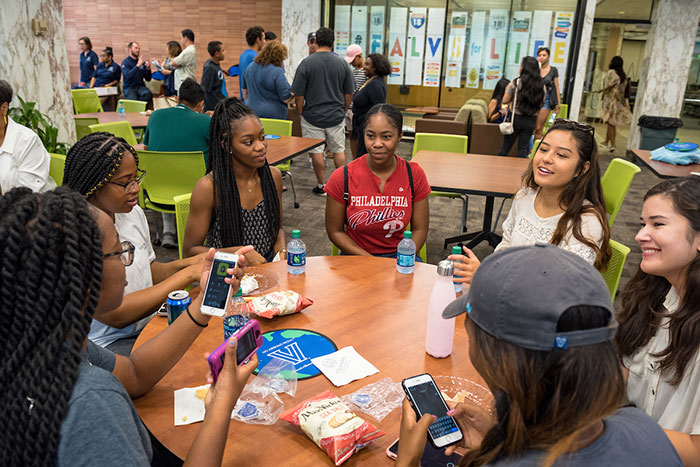 Students sitting at table