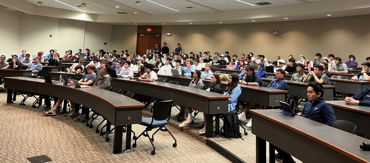 students listening to speaker