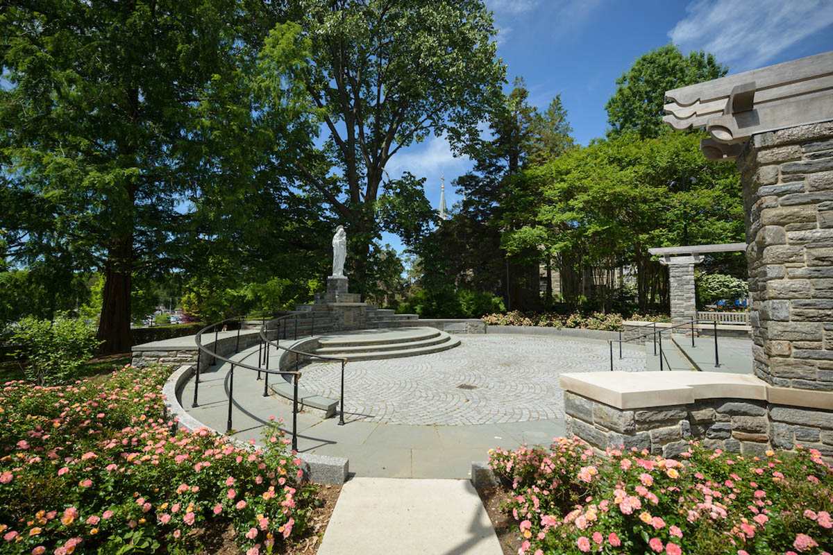 Image of the Grotto surrounded by flowers