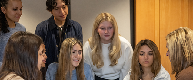 Image of Villanova students talking on campus